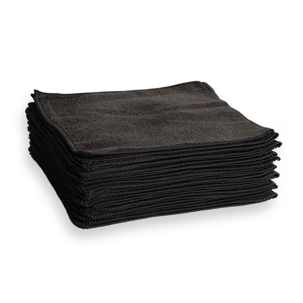 A stack of small charcoal microfibre cloths.