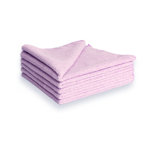 A stack of lilac microfibre cleaning cloths on a white background