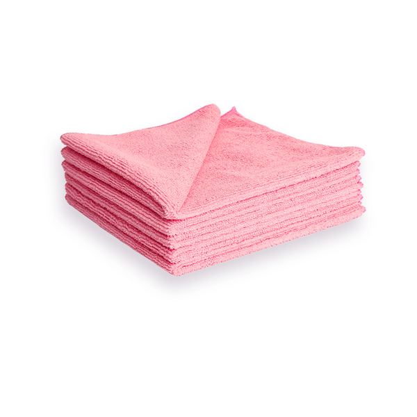 A stack of pink microfibre cleaning cloths on a white background