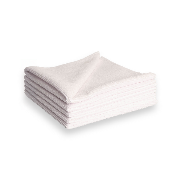 A stack of white microfibre cleaning cloths on a white background