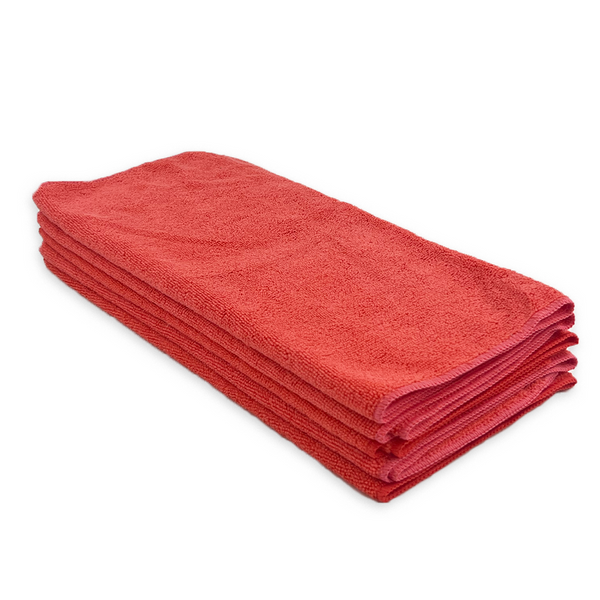 A stack of red microfibre cloths on a white background