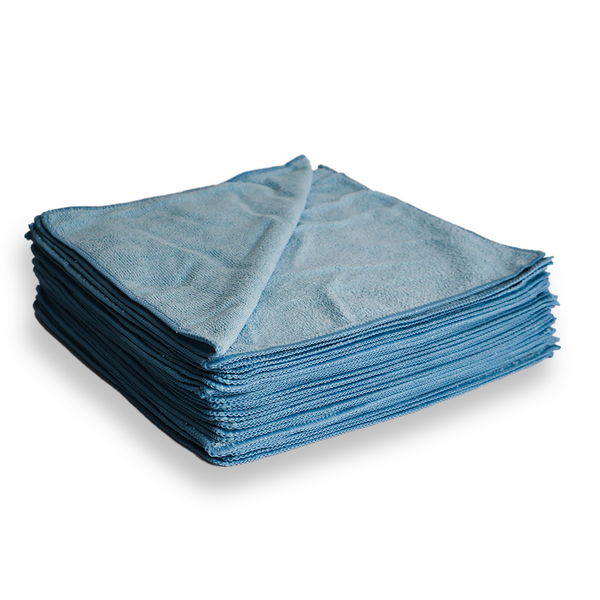 Stack of blue microfibre cloths on a white background