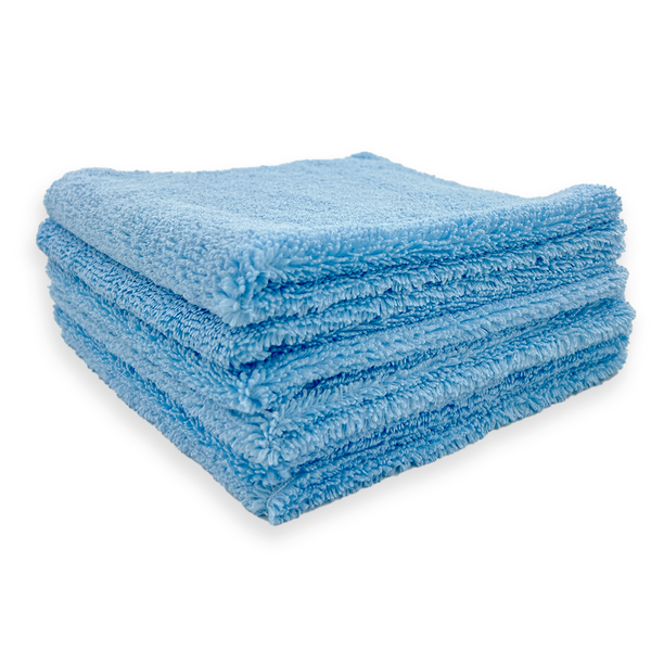 A stack of blue 310 gsm microfibre cloths