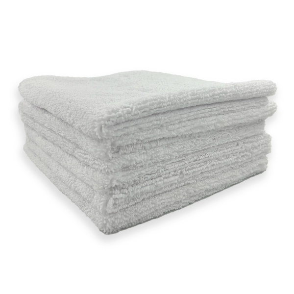 A stack of white 310 gsm microfibre cloths