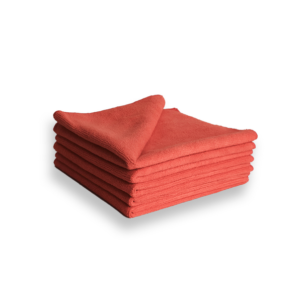 A stack of red 330gsm microfibre cloths.