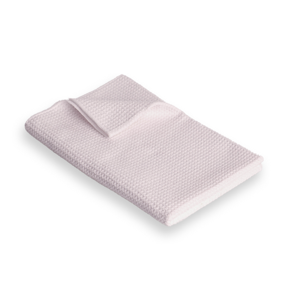 A large white woven microfibre cloth with a waffle texture.