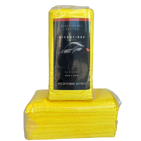 A pack of yellow microfibre cloths in packaging labeled 'Black Label Microfibre Towel'