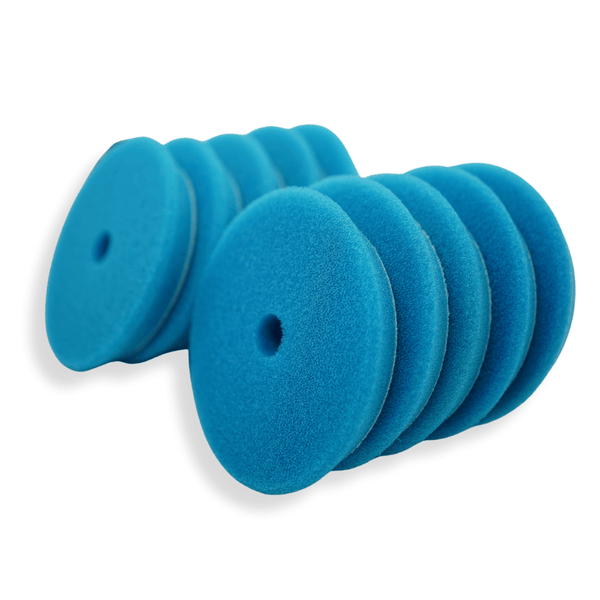 A stack of blue 6 inch foam buffing pads on a white background