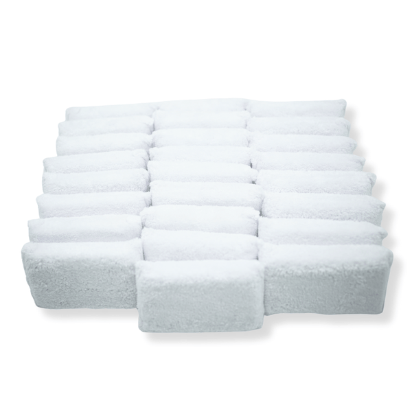 Bulk stack of white plush microfibre applicators