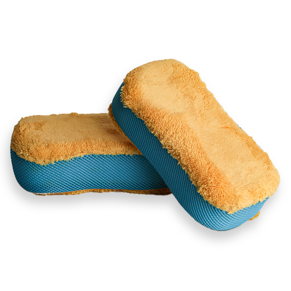 Two plush microfibre car cleaning sponges with one side orange and the other blue, designed to be soft on paint.
