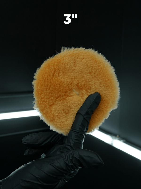 wool polishing pad on a black background