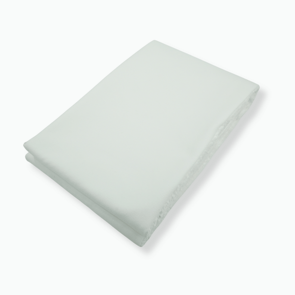 Folded white microfibre fabric on a white background