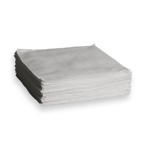 A stack of small white microfibre cloths 
