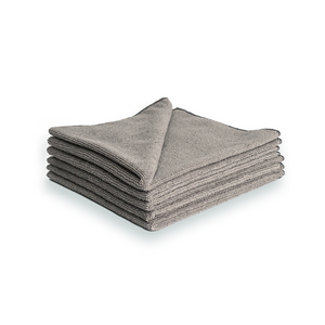 A stack of light grey microfibre cleaning cloths on a white background