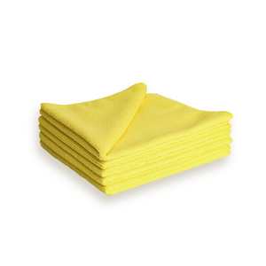 A stack of yellow microfibre cleaning cloths on a white background