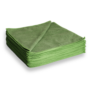 A stack of green cloths on white background