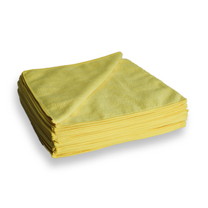 A stack of yellow cloths on a white background