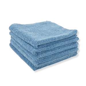 A stack of blue microfibre towels on a white background