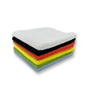 Stack of colourful microfibre cloths on a white background