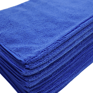 A close up shot of a stack of blue microfibre cloths 