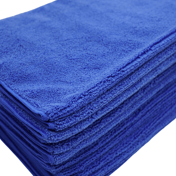 A close up shot of a stack of blue microfibre cloths 