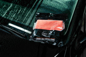 ADBL Double Mini Twisted Towel package with premium twisted pile features on wet surface