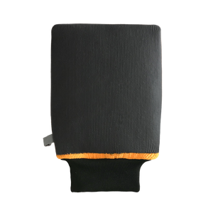 A clay mitt with a black band on a white background