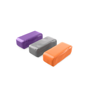Purple, orange and grey clay bars on a white background