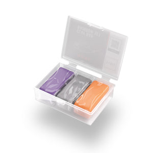 A box of 3 coloured clay bars  on a white background