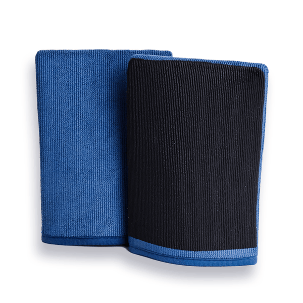 Close-up of a blue and black textured clay mitt