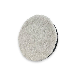 A white coral fleece buffing pad constructed from coral velvet microfibre, on a white background