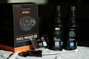 ADBL Wheel Protect Set components including Tire Dressing 0.5L, Rimtector 0.5L, and One Shot Tire Pad applicator