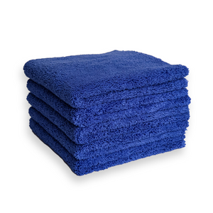 A stack of plush blue microfibre towels