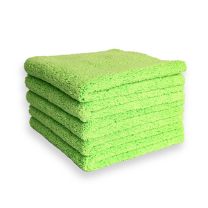 A stack of plush green microfibre cloths