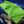 A green microfibre cloth on a blue car bonnet.