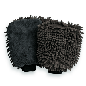 Two gray chenille cleaning pads on a white background