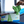 Person holding a green microfibre cloth above a box of Wipes-once cloths on a vehicle.