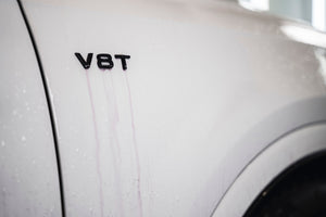 ADBL Vampire Deironizer Bleed Effect on White Car Paint - Iron Fallout Turning Purple on V8T Fender Badge
